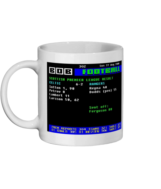 Celebrate Celtic’s famous 6–2 Old Firm win over Rangers in 2000 with this white ceramic 11oz mug featuring a retro Ceefax style Page 302 design.